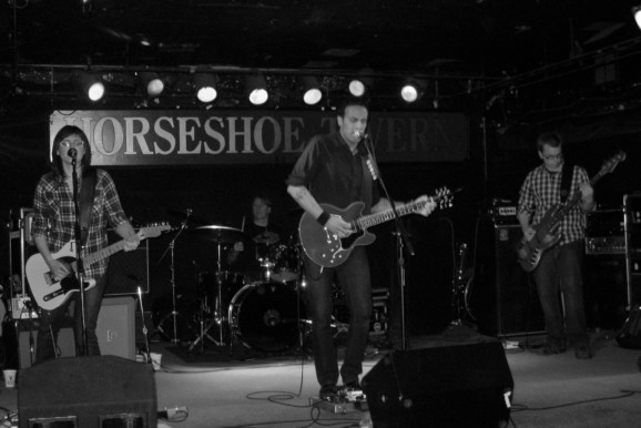 a rock band playing music