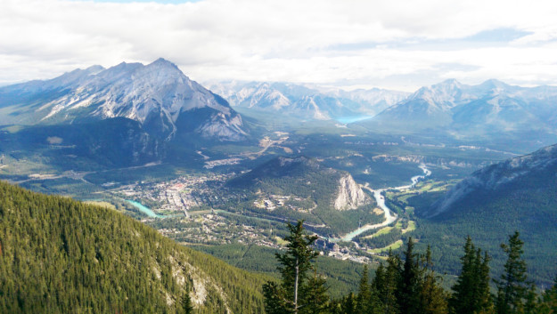 a majestic valley with rivers winding through