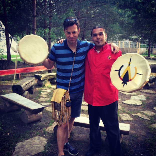 two men display their traditional drums