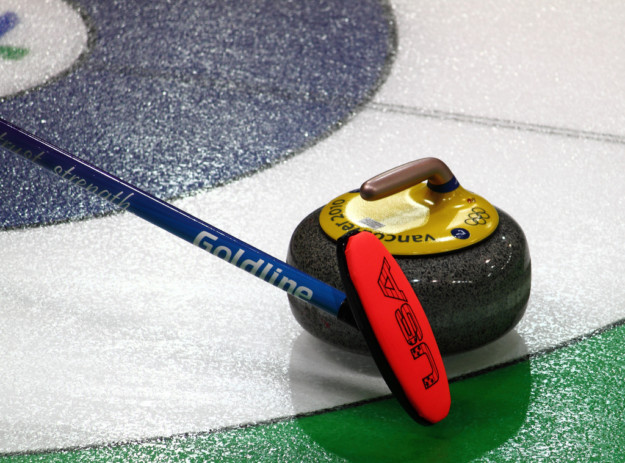 a curling stone on the ice