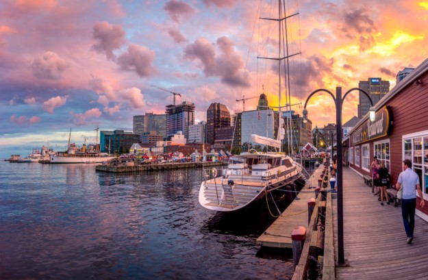 Walk along the Halifax Waterfront and get a view of the skyline from a taxi boat
