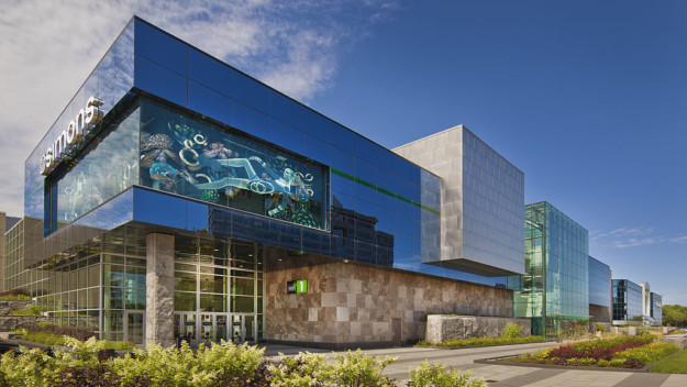 the exterior of a modern shopping mall