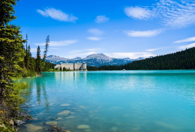 a view across the light blue water of lake louise