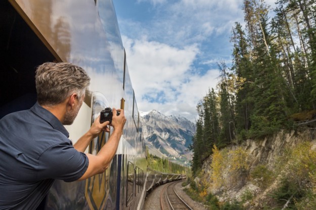 Rocky Mountaineer passenger taking pictures
