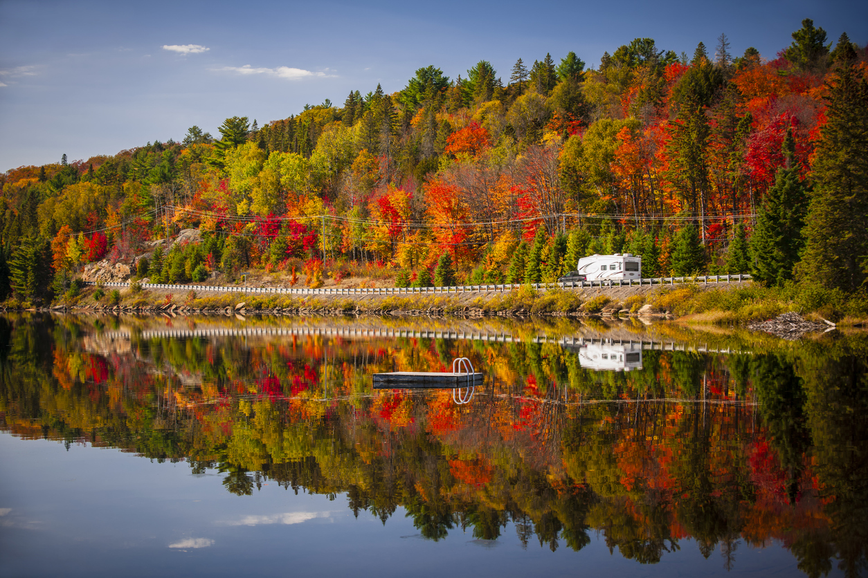 A motorhome parked next to a lake in Canada