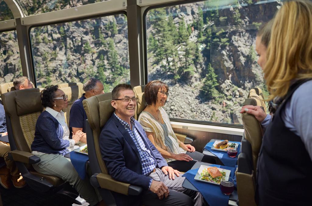 Passengers on the Rocky Mountaineer enjoying their food