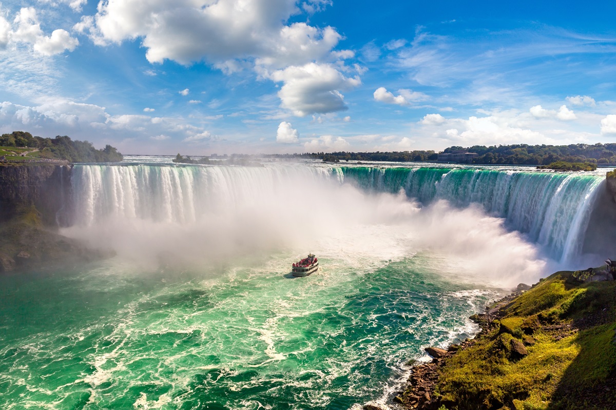 A boat approaches the foot of Niagara Falls