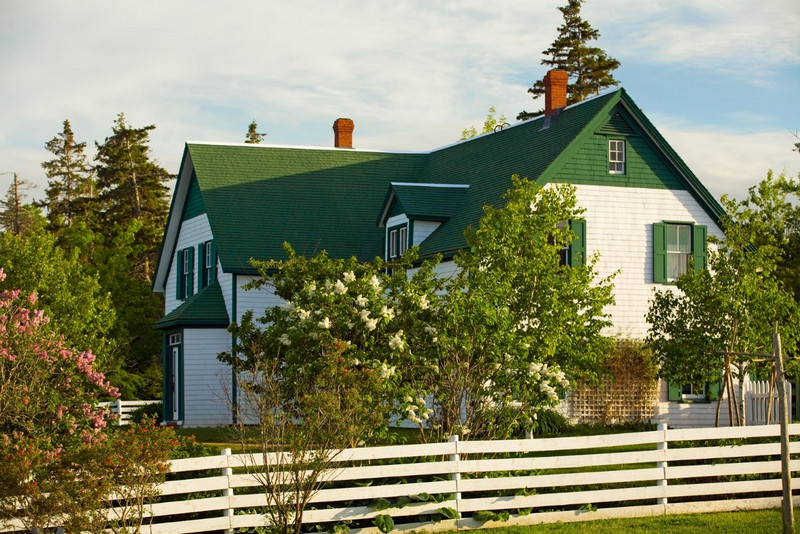 the white and green wooden plank Anne of Green Gables house