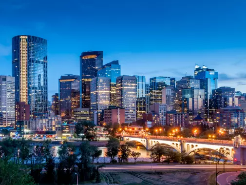 istock-481574937_calgary_skyline_night_bow_river_and_centre_street_bridge_calgary_alberta.jpg