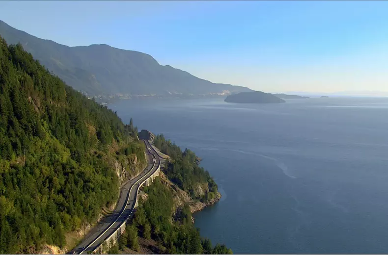 cars-driving-the-sea-to-sky-highway-between-vancouver-and-whistler-with-ocean-and-mountains-in-the-background-2-6805-credit---destination-bc.jpg