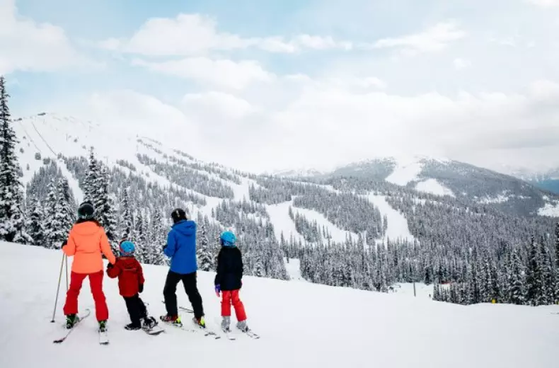 A family skiing in Jasper
